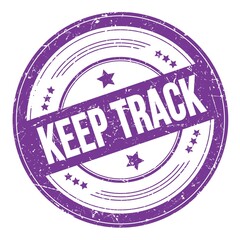 KEEP TRACK text on violet indigo round grungy stamp.