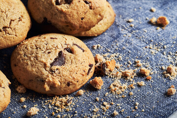 Chocolate chip cookies on table closeup. Homemade crunchy chocolate cookies bisquits on table.