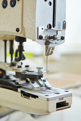 Industrial sewing production or atelier. Sewing machines for creating clothes.
