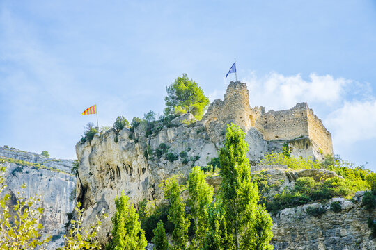Ruins of the Castle of the Bishops of Cavaillon overlooking Fontaine de Vaucluse village in Provence, France