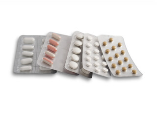 A set of five various pills in silver blisters isolated on white background.