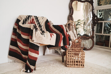 Fototapeta na wymiar chairs in the boho room with carpet and wood
