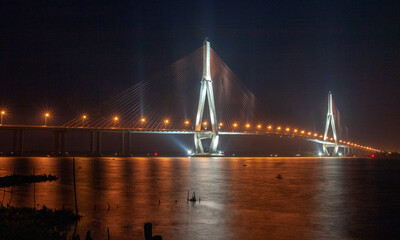 Can Tho Bridge in Vietnam, Can Tho Bridge in the evening Lights up, looks like a meandering dragon