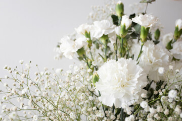 Bouquet of white flowers gypsophiles and carnations