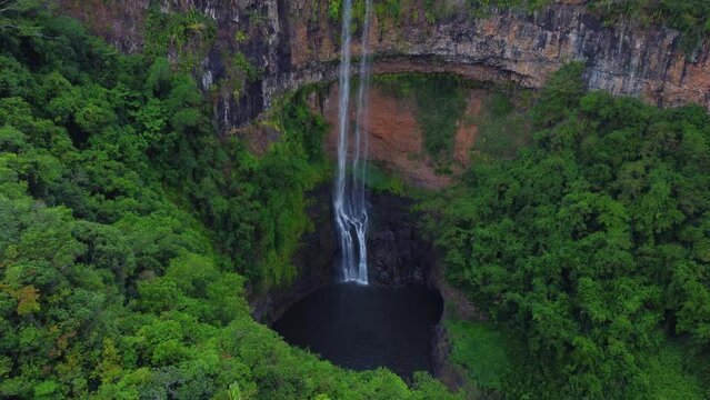 Chamarel Falls on the island of Mauritius, drone video of the waterfall surrounded by jungle