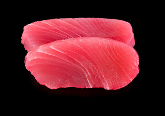 Raw tuna fish isolated on black background