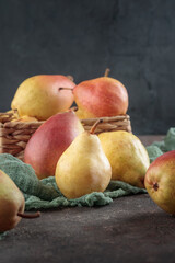 Various pears on a dark background