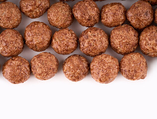 Variety of cold cereals, quick breakfast for kids overhead shot. Quick breakfast. Chocolate balls isolated on a white background. Rings isolated on a white background. 