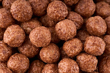 Variety of cold cereals, quick breakfast for kids overhead shot. Quick breakfast. Chocolate balls isolated on a white background. Rings isolated on a white background. 