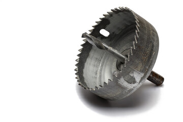 Closeup steel hole saw tool white background