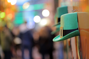 Green St Patrick's hats in a street in Dublin as evening falls on St Patrick's Day In Ireland