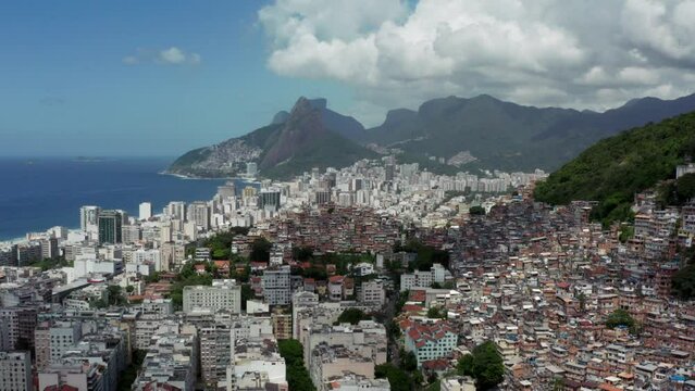 Aerial view Rio de Janeiro Brazil cityscape. Downtown favelas and beautiful mountain landscape with Atlantic coast.