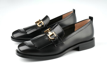 Loafers isolated on white background. Pair of Stylish Expensive Modern Leather Black Loafers Shoes....