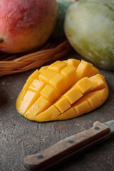 Mango fruit on a dark table