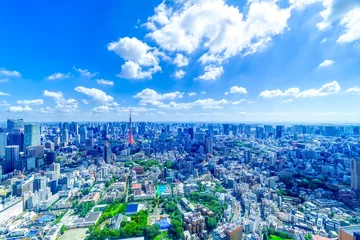 Fotobehang 東京風景　大都会を流れる雲 © oka