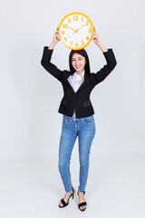 pretty young asian business woman feeling happy and smile with hands  showing alarm clock and pointing, Portrait positive successful confident beautiful young female.