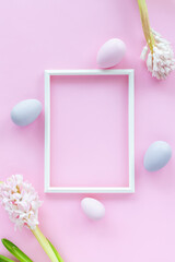 Fototapeta na wymiar Minimalistic Easter postcard on a pink background