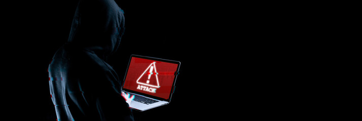Cyber hacker attack concept. Internet web hack technology. Blurred Digital laptop in hacker man hand isolated on black with glitch effect. Information security terms cybersecurity banner.