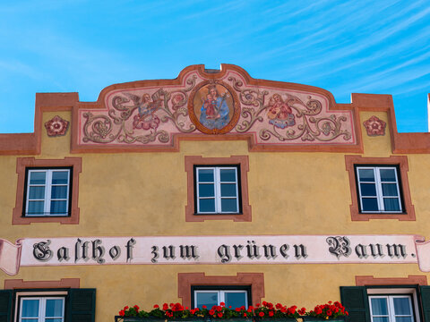 Glurns, Italy - September 28, 2021: Inn Gasthof zum grunen Baum in Glorenza - Glurns in South Tyrol. Translation of the sign: Green Tree Inn.