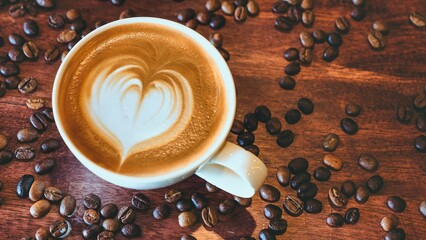 coffee latte art on wood table flat lay , relax time, cafe barista art top view.