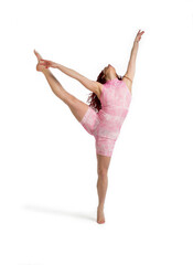 young woman dancer doing dance exercises on a white background