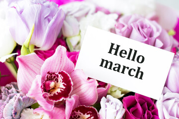 Hello March text on a card against a background of beautiful colors