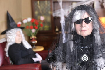 Spooky wicked lady wearing sunglasses