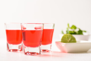 Red tequila with lime and mint on white background, Tropical spring and summer vacation concept