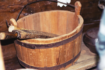 wooden bucket with rolling pin, 
wash