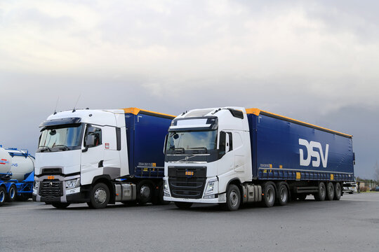 White Volvo FH and Renault Trucks T on a Yard