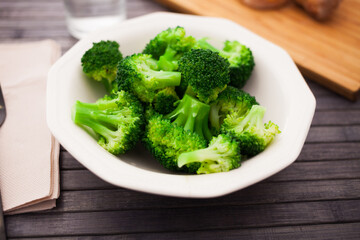 diet food. steamed broccoli on plate