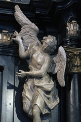 Fototapeta premium Angel statue in the chapel of Our Lady of the Kamenita vrata (Stone Gate) in Zagreb, Croatia