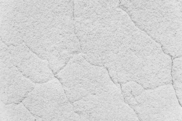 Cracks on white concrete surface cracked weathered cement worn texture broken abstract damaged background