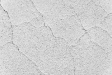 Cracks on white concrete surface cracked weathered cement worn texture broken abstract damaged background