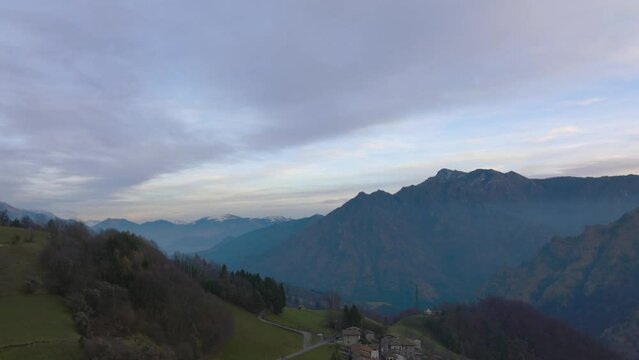 Beautiful aerial view of the Seriana valley and its mountains at sunrise, Orobie Alps, Bergamo, Italy