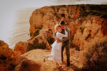 wedding couple shooting on the algarve lagos portugal at the beach 