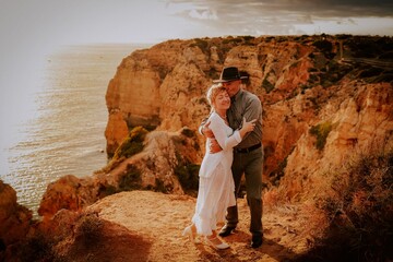 wedding couple shooting on the algarve lagos portugal at the beach 