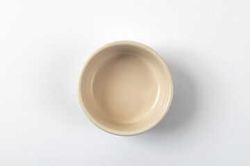 porcelain sauce bowl on a white background