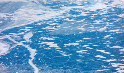 Aerial view of amazing baikal lake -  - Transparent cracked blue ice at sunrise - Baikal, Siberia, Russia