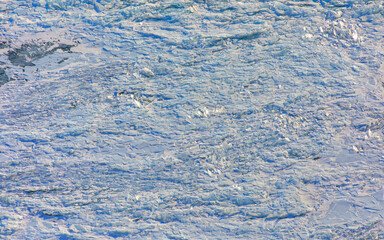 Aerial view of amazing baikal lake -  - Transparent cracked blue ice at sunrise - Baikal, Siberia, Russia