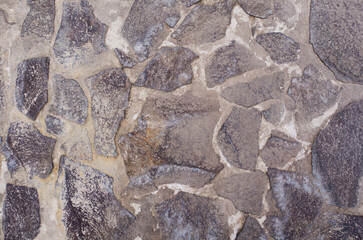 Gray stone background close-up. Grunge stonework texture