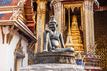the so called Hermit doctor at a pillar in  the temple in the Grand Palace.