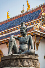 the so called Hermit doctor at a pillar in  the temple in the Grand Palace.