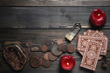 Tarot cards on the old wooden fortune teller table background with copy space. Future reading concept.