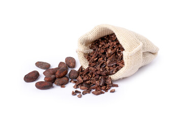 Cocoa nib in sack bag with dry cacao beans isolated on white background.