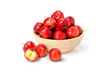 Acerola cherry in wooden bowl isolated on white background. 