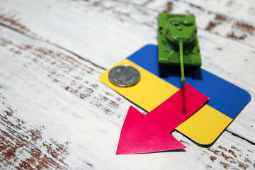 ukraine flag with toy tank and hryvnia coin crisis war russia wallpaper