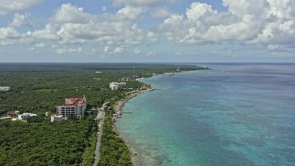 Cozumel Mexico Aerial v7 drone flying along the coastal shore capturing seaside hotel and resorts with stunning landscape and seascape views - September 2020