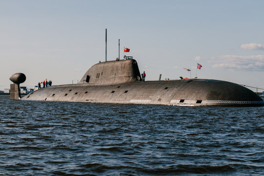 View from the water of nuclear submarines in the waters of the Gulf of Finland.Preparation for the military parade on the Day of the Navy in Kronstadt.A missile submarine.Russia,Kronstadt,30.07.2021