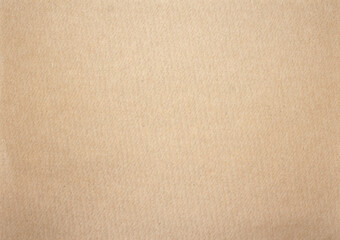 Fototapeta na wymiar Kraft paper or cardboard background. Brown Paper texture. Empty mock-up. Close-up.